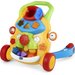 Grający pchacz Chicco - żółty